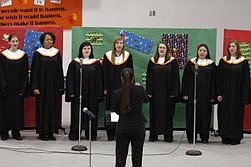 The High School Choir consists of Nikki Wolery, Mahala Harris, Dominique Kovar, Sierra Joner, Kendall Knight, Anna Buchanan, and Ashlyne Hand, who performed their Chirstmas repertoire last Tuesday evening at the Plains School Concert.