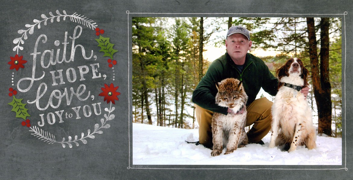 &lt;p&gt;Kevin Moore was happy to pose with his two beloved pets again this year for his annual Christmas photo card. His 20-year-old lynx Misha survived cancer, and his dog Tucker helped rescue Moore from a Sunday morning rollover that injured both Moore and his dog. &#147;I have the two best pets in the world,&#148; he said Monday after being released from the hospital.&lt;/p&gt;