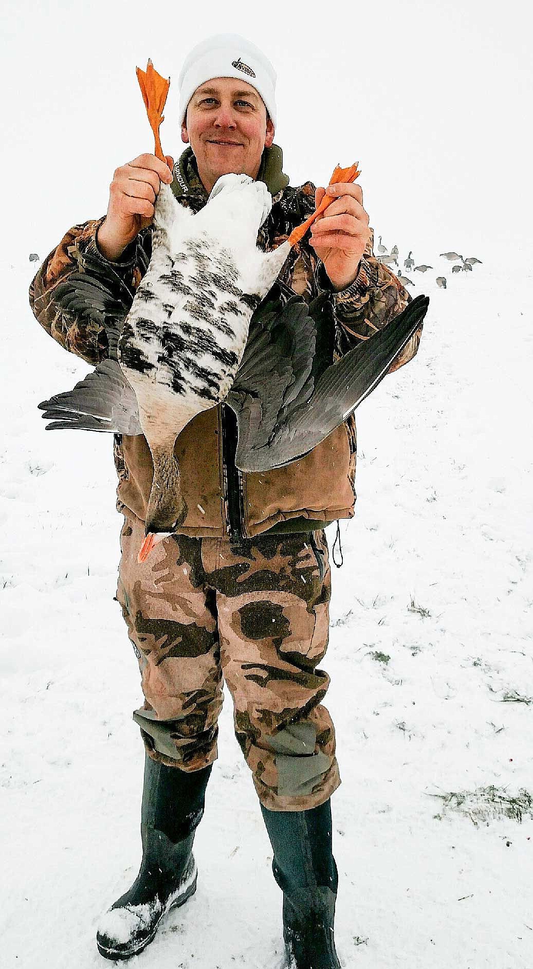 Brian Batzell, Meseberg Adventure Goose Guide, holds a Specklebelly Goose taken on a Royal Slope field hunt.