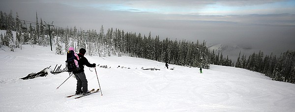<p>Skiers head down the slopes of Blacktail on Monday, December 24, in Lakeside.</p>