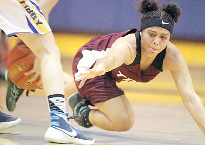 &lt;p&gt;Olivia Roach attempts to strip the ball from Libby's Trinity Wallace in fourth quarter Tuesday evening.&lt;/p&gt;