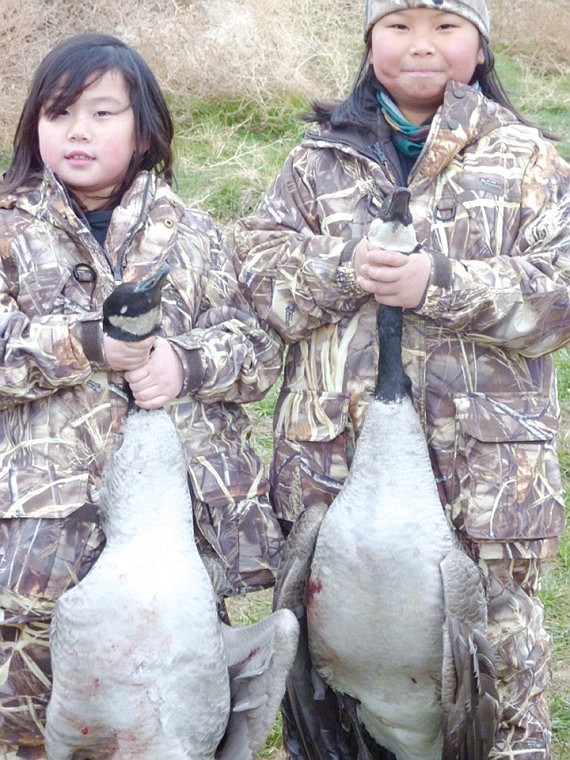 The Zubeck girls from Alaska enjoyed a day of hunting with their
parents and uncle. They loved watching all the birds come and then
running out to retrieve the geese.