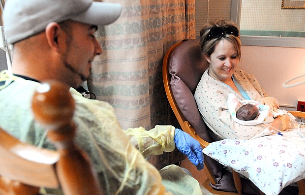 Luke Richard and Lisa Street with their newborn daughter Jayden Marie Richard on Wednesday, December 22, at Kalispell Regional Hospital.