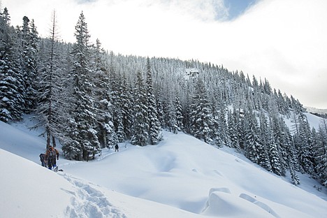 &lt;p&gt;The group crosses an open hillside along the trail to Revett Lake.&lt;/p&gt;