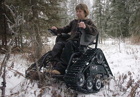 &lt;p&gt;Jill Erickson maneuvers her new Action Trackchair through her wooded property in Soldotna, Alaska, Dec. 12.&lt;/p&gt;