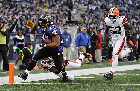 &lt;p&gt;Ravens running back Ray Rice (27) scores a touchdown after running past Cleveland's Usama Young and D'Qwell Jackson during the first half Saturday at Baltimore.&lt;/p&gt;