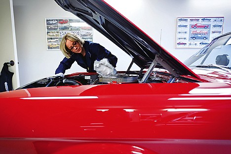 &lt;p&gt;Sarah Marossy details the engine bay of her 1966 Mustang GT350 at her garage in Coeur d'Alene. Marossy grew up working on cars alongside her father and her passion for Mustangs has grown to a collection of the muscle cars.&lt;/p&gt;