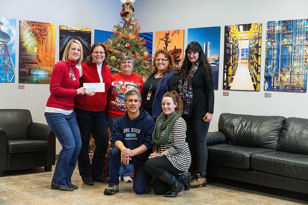 &lt;p&gt;SHAWN GUST/Press Staff from Transtector Systems gather to make a donation of $2,240 to Press Christmas for All Wednesday at their Hayden office. Employee contributions and employer match funds make up the donation. From left, Brittany Stockstill, Julie Bailey, Sonia Hebert, Hank Harrison, Nancy Kjos, Jennifer Hawkins and Shari Rose.&lt;/p&gt;