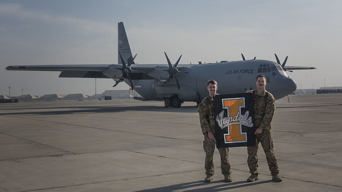 &lt;p&gt;Capts. Nicholas Bonner and David Tart, 455th Expeditionary Airlift Squadron pilots, pose with a University of Idaho flag in front of a C-130J Hercules at Bagram Airfield, Afghanistan, Dec. 3, 2016. Bonner is a Boise, Idaho native, and Tart is a Coeur d&#146;Alene, Idaho native. Both graduated from the University of Idaho in 2012.&#160;&lt;/p&gt;