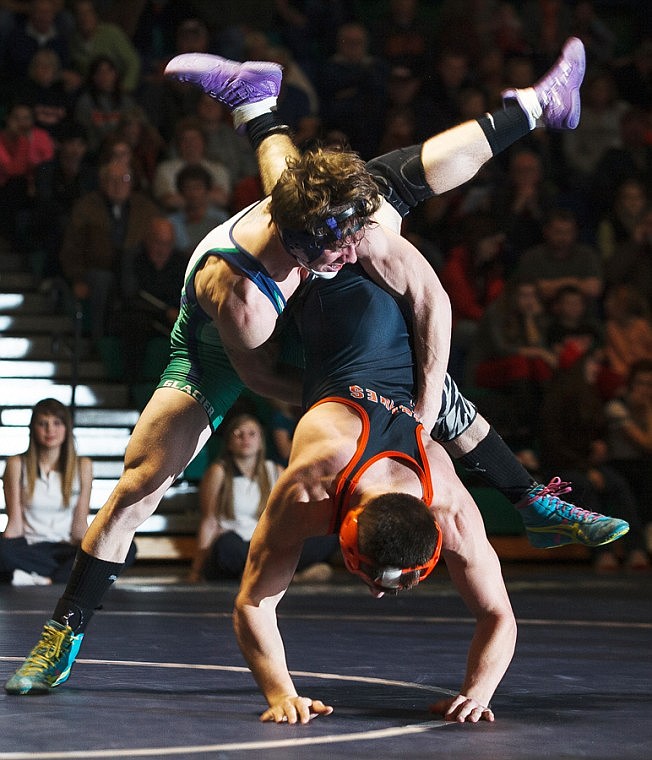 &lt;p&gt;Patrick Cote/Daily Inter Lake Glacier's Grant Tafoya (left) takes down Flathead's Jake Shaffer during the 171-pound match Thursday evening during the Crosstown wrestling dual at Glacier High School. Thursday, Dec. 20, 2012 in Kalispell, Montana.&lt;/p&gt;