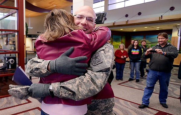 &lt;p&gt;Psc. Collin Wunderlich of Kalispell, a member of the Army National Guard, gets a hug from his mother Paula Wunderlich on Monday afternoon, December 18, as he arrives home from Advanced Individual Training in Va. Wunderlich left the Flathead in August for Basic Training at Fort Leonard Wood, Mo. He then went straight on to AIT. When he returns to AIT he will still have six weeks before he finishes and will then be stationed in Kalispell.&lt;/p&gt;