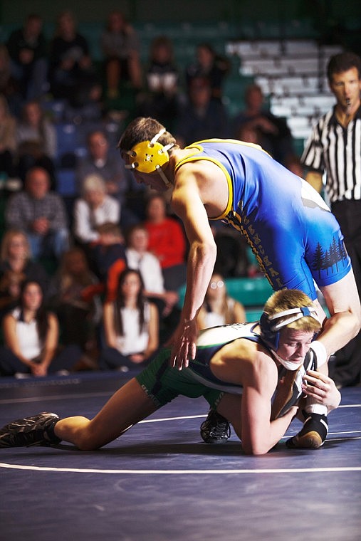 <p>Glacier’s Quinn Barber (bottom) tries to hang on as Libby’s Michael Ayala makes an escape during their 130-pound match Tuesday evening at Glacier High School. </p>