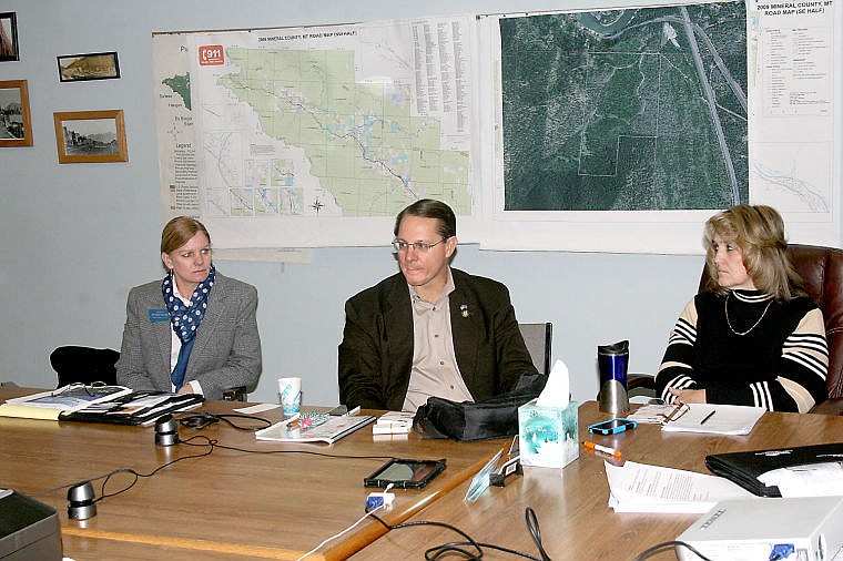 &lt;p&gt;Senator Jennifer Fielder and Commissioner Laurie Johnston listen to Utah Representative Ken Ivory's explanation of public land legislation at the County Commissioner's meeting on December 13.&lt;/p&gt;