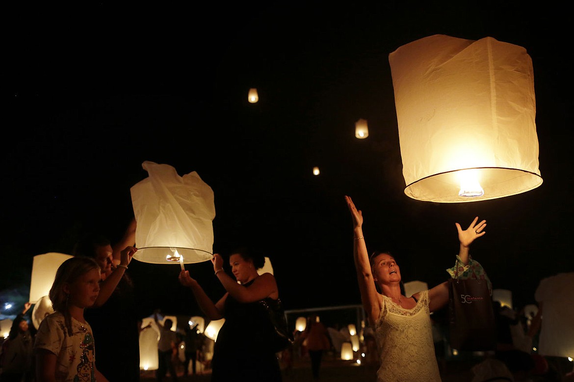 &lt;p&gt;A woman releases a lantern while others light theirs &#151; symbolizing the release of spirits &#151; during a commemoration service Friday in Ban Nam Khem, Thailand, for victims of the Asian tsunami that struck 10 years ago on Dec. 26, 2014. (AP photo)&lt;/p&gt;