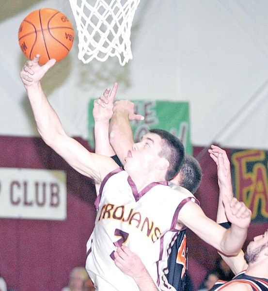 &lt;p&gt;Senior guard Cory Orr stretches for an offensive rebound first
quarter vs Plains.&lt;/p&gt;