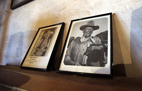 &lt;p&gt;A photo of actor John Wayne rests on a counter of a saloon, built for Wayne's 1960 movie &quot;The Alamo,&quot; in Brackettville, Texas, on Dec. 4.&lt;/p&gt;