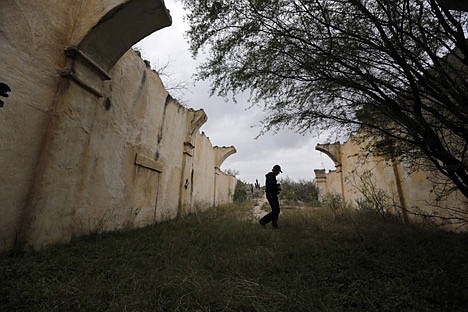 &lt;p&gt;Rich Curilla walks through a replica of the Alamo, built for John Wayne's 1960 movie &quot;The Alamo,&quot; in Brackettville, Texas, on Dec. 4.&lt;/p&gt;