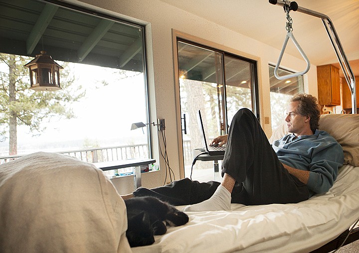 &lt;p&gt;Blaine Wright uses his computer while resting in his bed at his
home in Whitefish Tuesday afternoon. Wright is still recovering
from his Oct. 29 skydiving crash at Washington-Grizzly Stadium.&lt;/p&gt;