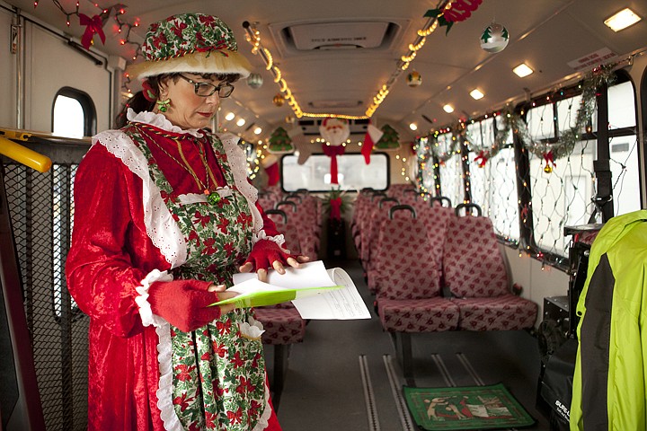 &lt;p&gt;Eagle Transit driver Storm Yetter, dressed as Mrs. Claus, checks
her route schedule inside of her Christmas themed bus Monday
morning.&lt;/p&gt;