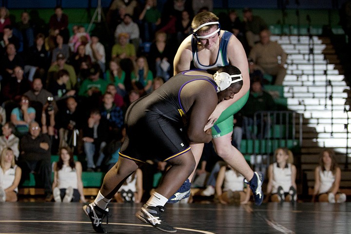 &lt;p&gt;Glacier's Zach Dennehy, right, is taken airborne by Sentinel's
Matt Brownlow during the Wolfpack's home dual against Missoula
Sentinel Tuesday night.&lt;/p&gt;