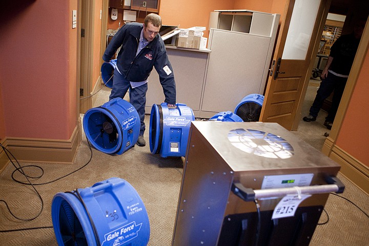 &lt;p&gt;Rainbow Restoration and Cleaning service technician Scott
Alsbury adjusts fans drying the carpet of an office in the Flathead
County Courthouse on Tuesday morning. A sprinkler problem early
Tuesday morning caused flooding and water damage to the recently
remodeled courthouse.&lt;/p&gt;