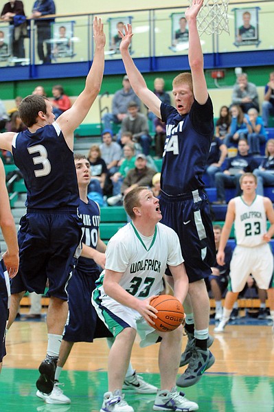 &lt;p&gt;Glacier senior Karl Hellwig, 33, prepares to shoot for two
during the game against Lake City on Thursday night in
Kalispell.&lt;/p&gt;