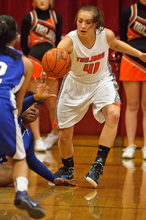 <p>SHAWN GUST/Press Dani Failor of Post Falls takes the ball after Federal Way's Lamonica Jackson fell to the floor during the first quarter.</p>