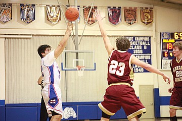 &lt;p class=&quot;p1&quot;&gt;Nikko Alexander shoots over a Falcons defender.&lt;/p&gt;