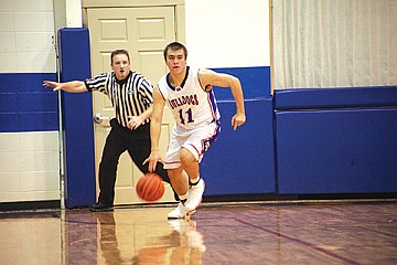 &lt;p class=&quot;p1&quot;&gt;&lt;span class=&quot;s1&quot;&gt;Stuart Grant sprints up the court during last Thursday&#146;s game.&lt;/span&gt;&lt;/p&gt;