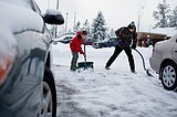 Teens help clear snow for Kathy Reed House