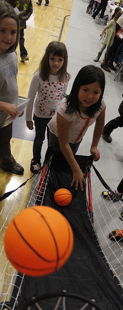 &lt;p&gt;Second grader Graceann made the most shots for all the second graders during Linderman Elementary School's All-School Christmas Market on Thursday, Dec. 18.&lt;/p&gt;