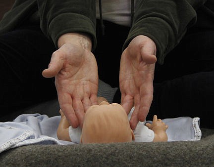 &lt;p&gt;Licensed massage therapist Mary Gertson shows how to rub a baby under the chin to help relieve teething pain Friday during the monthly Parents as Teachers program at the Lake County Public Health Department in Polson. Vince Lovato / Leader photo&lt;/p&gt;