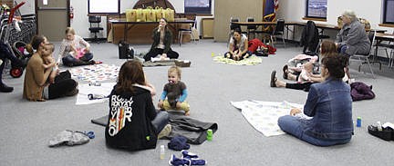 &lt;p&gt;Six moms and their babies took advantage of the Lake County Public Health Department's monthly Parents as Teachers event Friday. Licensed massage therapist Mary Gertson demonstrated how to massage a baby safely. Vince Lovato / Leader photo&lt;/p&gt;