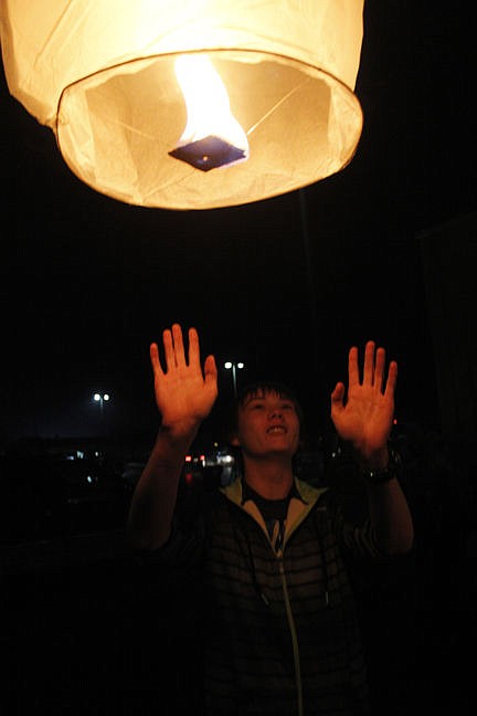 &lt;p&gt;Kohl Lawson, 17, a Ronan High School student, releases a lantern to remember his grandmother, Lorena Lawson, during the third annual Ronan Remembrance on Thursday, Dec. 18 at Ronan High School. More than 90 people donated $5 to set aloft a lantern to remember loved ones who can't be here for the holidays. The Ronan High School Student Council sponsored the event and collected more than $500, said advisor Bonnie Eva. Vince Lovato / Leader photo&lt;/p&gt;