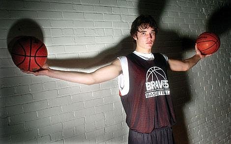 Flathead freshman Brock Osweiler, who stands 6 feet 8 inches tall and weighs 215 pounds, is Flathead&#146;s leading scorer and has already been invited to a summer camp for the top-100 freshman and sophomore basketball players in the country. Chris Jordan/Daily Inter Lake&lt;br&gt;The Land of Oz&lt;br&gt;He may be a freshman, but Brock Osweiler has the Braves thinking big