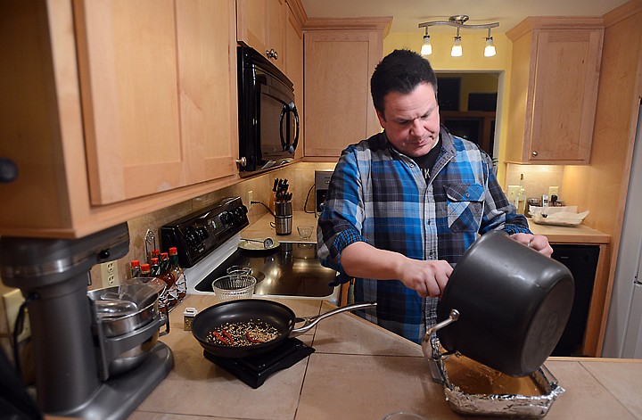 &lt;p&gt;Tyler Thompson whips up a fresh batch of lemon-coconut-curry fudge on Monday at his home in Lakeside.&lt;/p&gt;