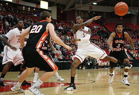 &lt;p&gt;Washington State guard Mike Ladd (2) passes the ball in front of Idaho State's Chris Hansen (20) during the first half Saturday at the Toyota Center in Kennewick, Wash.&lt;/p&gt;