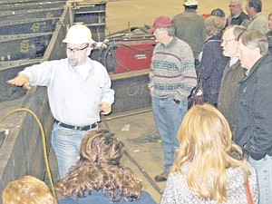 <p>Stinger Vice President of Montana Operations Steve Patrick explains the bridge-building operation during a tour in February.</p>