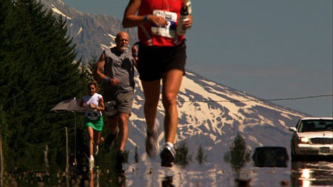 &lt;p&gt;Competitors run a leg of the 200-mile 'Hood to Coast' road race.&lt;/p&gt;