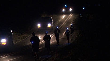&lt;p&gt;Runners utilize flashlights and headlights during nighttime legs of the &quot;Hood to Coast&quot; race.&lt;/p&gt;
