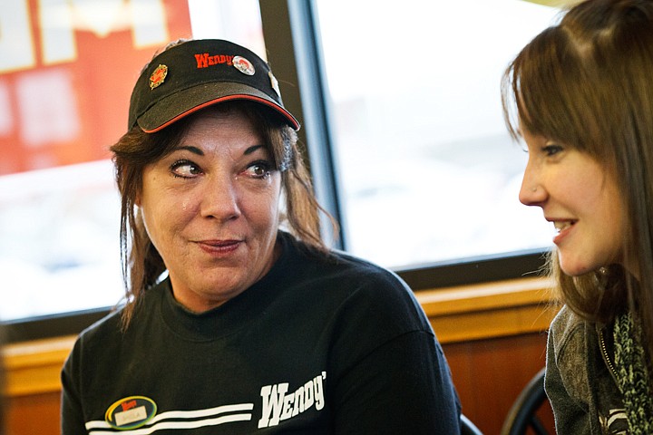 &lt;p&gt;Sheila Whitfield tears up while talking with co-worker Britiea Smith, 19, Thursday about how she and other Wendy's employees organized more than $800 to buy Whitfield a vehicle.&lt;/p&gt;