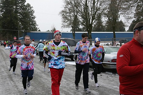 &lt;p&gt;A Dalton Gardens family completes the Hangover Handicap on Jan. 1, 2010. From left are Ryan Crandall, Cameron Crandall, Adam Crandall and Jeff Crandall.&lt;/p&gt;