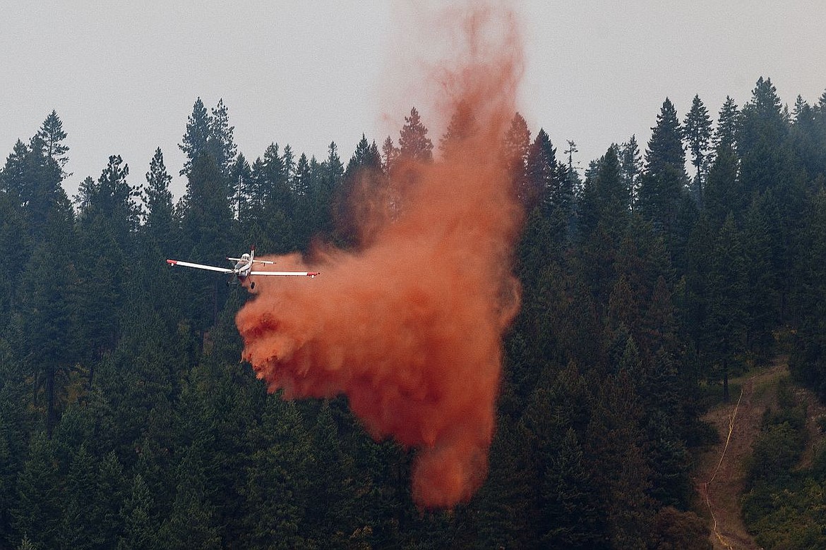 &lt;p&gt;An airplane used in air support efforts drops fire retardant on July 6, 2015 near the perimeter of the Cape Horn fire in Bayview.&lt;/p&gt;