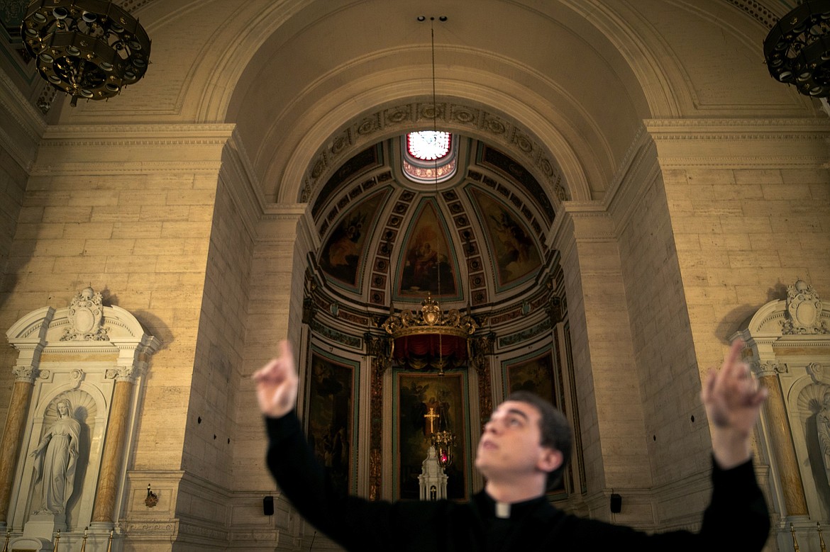 ADVANCE FOR SUNDAY, FEB 16 - Seminarian John Paul Heisler stands in a chapel at St. Charles Borromeo Seminary in Wynnewood, Pa., on Wednesday, Feb. 5, 2020. The historic seminary has sold its property and is preparing to move to a new location. (AP Photo/Wong Maye-E)