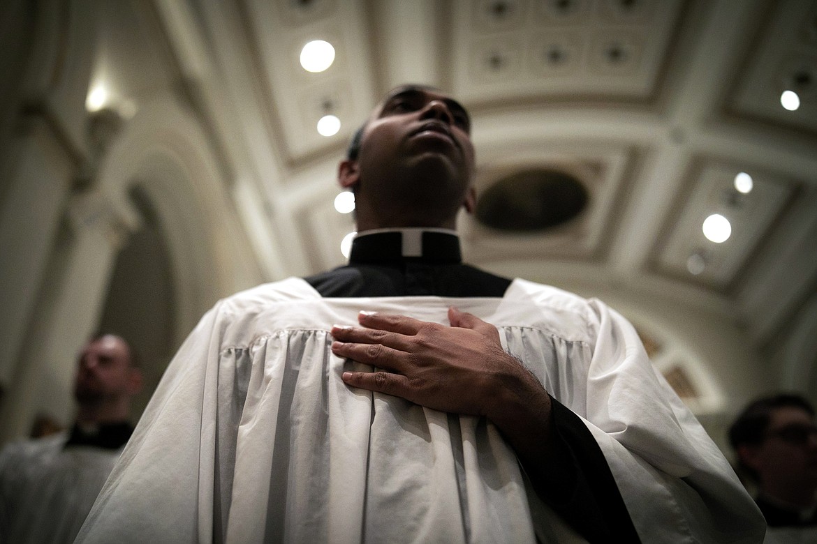 ADVANCE FOR SUNDAY, FEB 16 - Seminarian Ranjuna Perera from the Archdiocese of Colombo, Sri Lanka participates in Mass at St. Charles Borromeo Seminary in Wynnewood, Pa., on Wednesday, Feb. 5, 2020. Despite scandals in the Catholic Church, enrollment in U.S. seminaries has seen a slight increase in recent years. (AP Photo/Wong Maye-E)