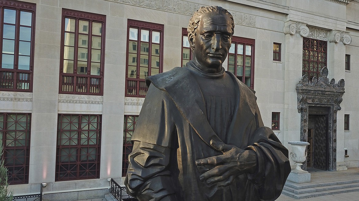 In this Sept. 12, 2019 photo, a statue of Christopher Columbus sits in front of  City Hall in Columbus, Ohio. Columbus Mayor Andrew J. Ginther announced on Thursday, June 18, 2020 that the statue at will be removed as soon as possible and placed in storage. (Doral Chenoweth III/The Columbus Dispatch via AP)