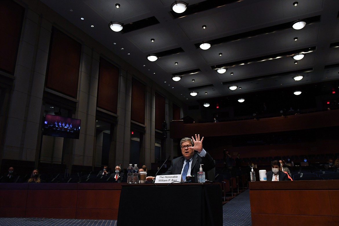 Attorney General William Barr testifies during a House Oversight Committee on Capitol Hill in Washington, Tuesday, July 28, 2020. (Matt McClain/The Washington Post via AP, Pool)