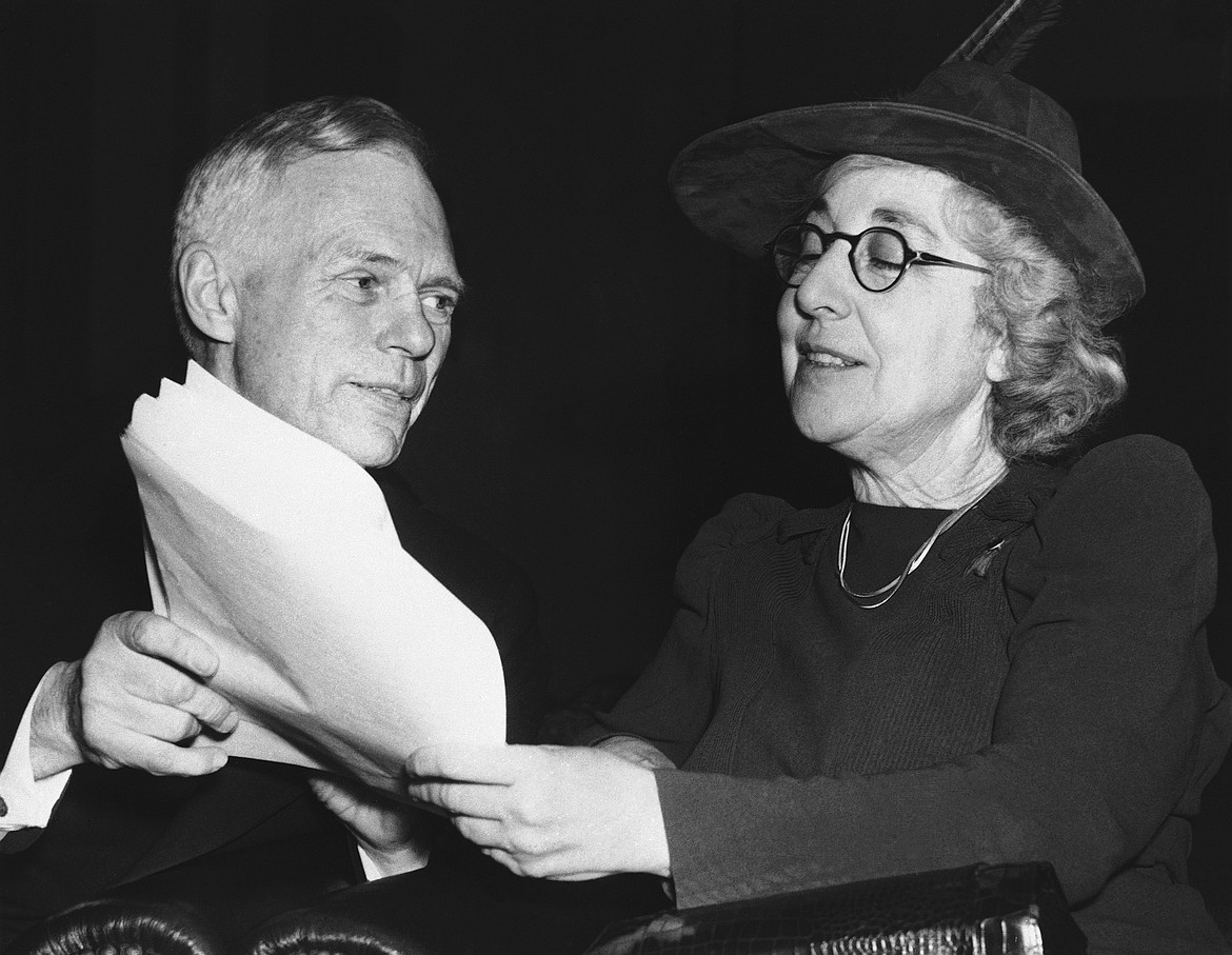 FILE - In this Feb. 2, 1940 file photo Jeannette Rankin, right, the nation's first woman congressman, is seen in an appearance with Frederick J. Libby before the House Naval Affairs Committee in Washington, D.C. Montana has not sent a woman lawmaker to Washington, D.C. in more than half a century. Women candidates are positioned to make significant gains in Montana's election this year with the highest number seeking statewide political office in at least two decades, including races for governor, U.S. House and other high-profile posts. (AP Photo,File)