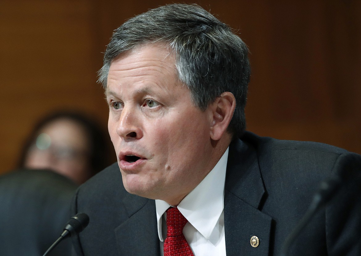 FILE - In this May 10, 2018 file photo, Sen. Steve Daines, R-Mont., asks a question during a Senate Appropriations subcommittee hearing on Capitol Hill in Washington. Montana voters on Tuesday, June 2, 2020, are choosing party nominees for governor, U.S. Senate and House and a slate of other offices in a primary election that was changed to all-mail balloting to protect against the spread of the coronavirus. Gov. Steve Bullock was expected to defeat first-time candidate John Mues for the Democratic nomination to challenge incumbent Daines.  (AP Photo/Jacquelyn Martin, File)
