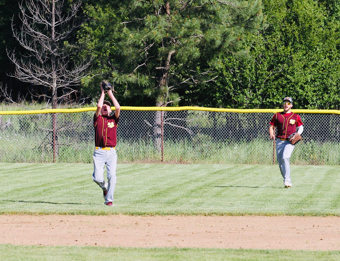 Reed Whatcott makes an inning-ending catch on a pop fly.